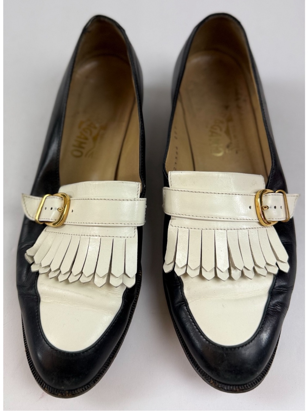 Salvatore Ferragamo Women’s Black/White Loafers Fringe and Gold Buckle Detail